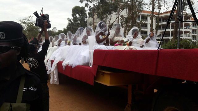 Pastor Robert Kayanja Weds 200 Couples in 77 Dogs Weddings