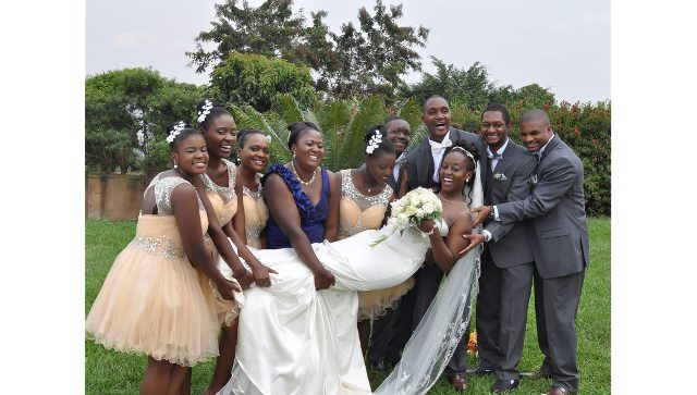 Pure joy and bliss at a wedding photo shoot by Dream Occasions Ug