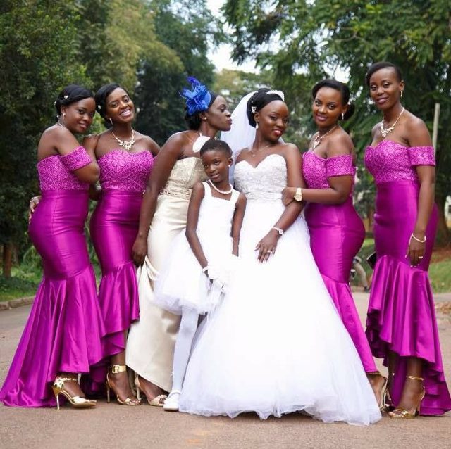 Joanna and her team at a wedding photoshoot, entourage dressed by Bloodworth