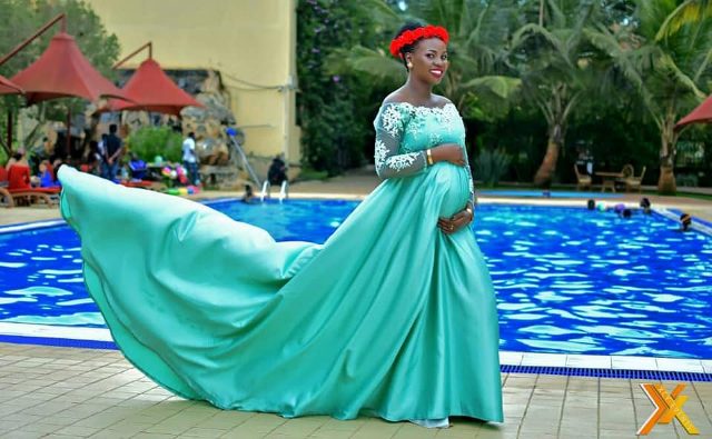 Bettie Betinah clad in a nice gown by Bloodworth