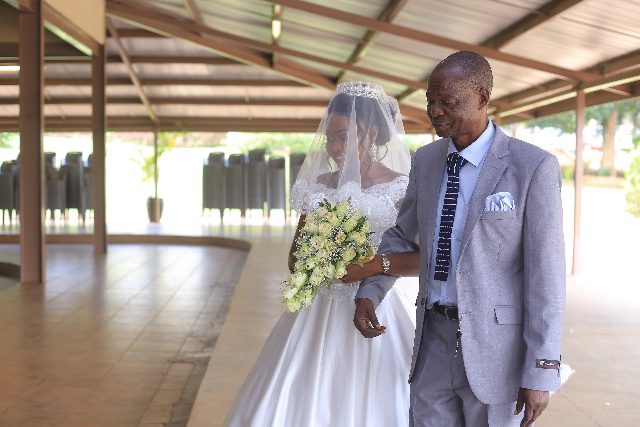 Andrew and Charity's Wedding By Rossy Roots