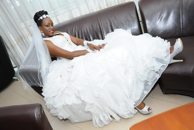 Doreen posing for a photo on her wedding day