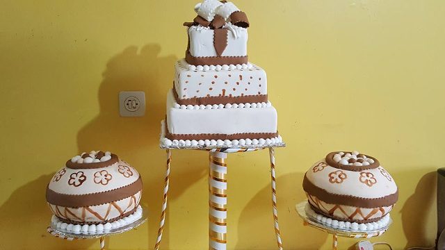 A customary wedding cake by New Day Bakery & Catering Services