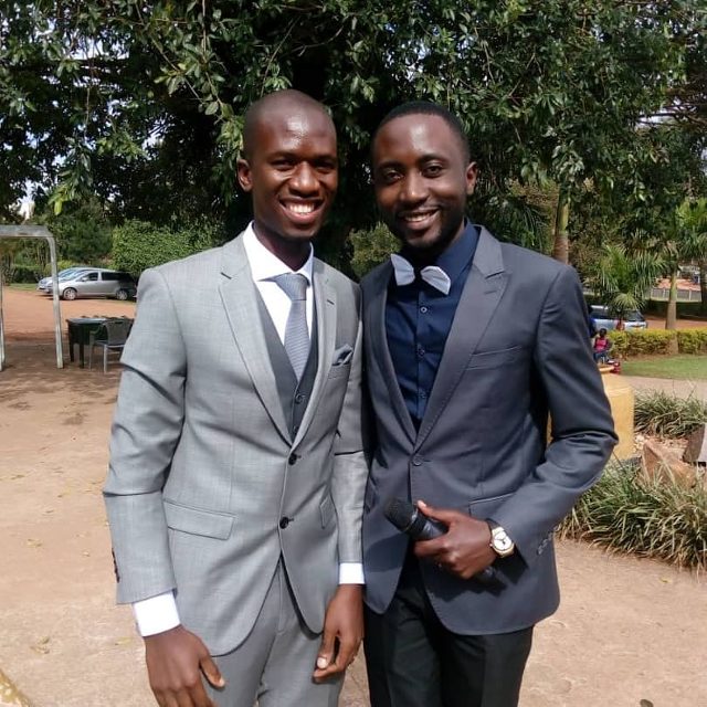 The Emcee with the groom, Thank you Mr & Mrs Kiyaga