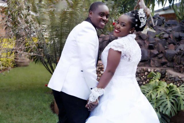 A bride and groom during a wedding photo shoot