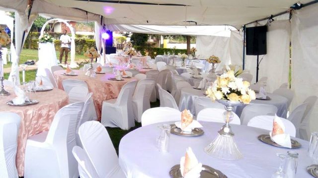 White & peach wedding decorations at Paya Gardens Nakulabye