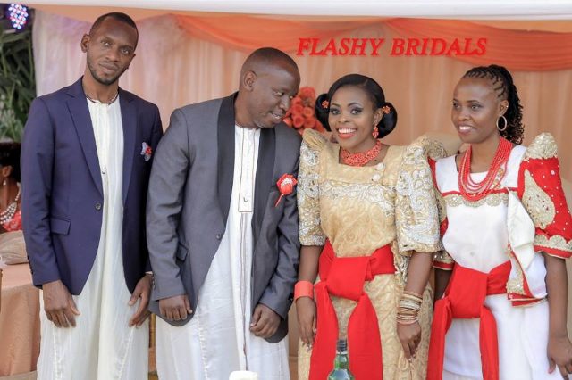 Barbara's Kwanjula Bridal Wear: Gold and Red Gomesi