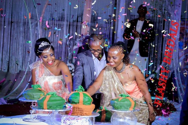Barbara's Kwanjula Bridal Wear: Gold and Red Gomesi