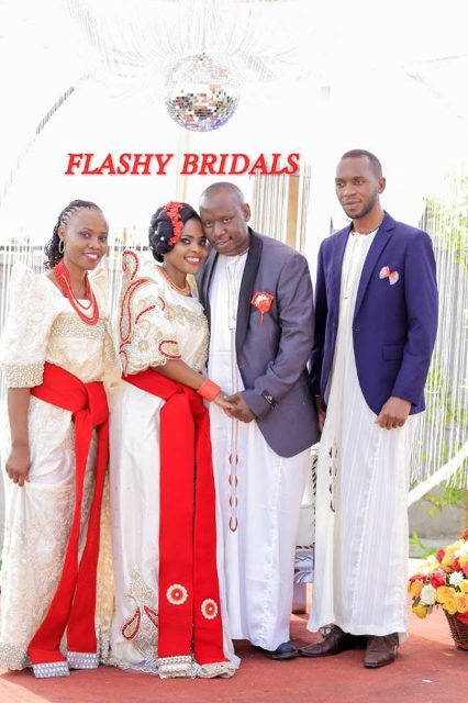 Barbara's Kwanjula Bridal Wear: Gold and Red Gomesi