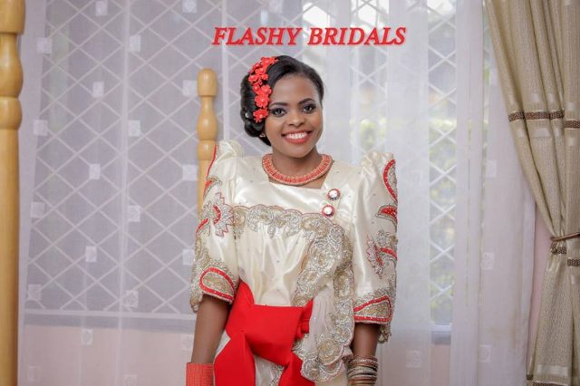 Barbara's Kwanjula Bridal Wear: Gold and Red Gomesi