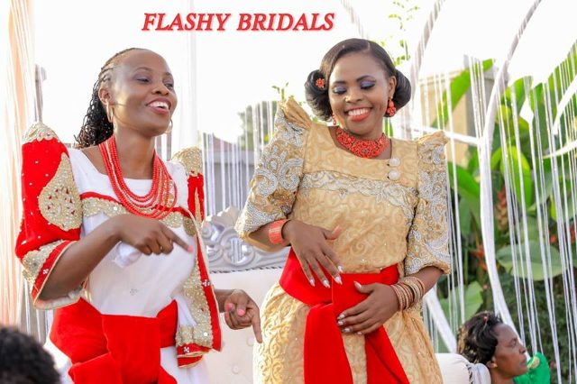Barbara's Kwanjula Bridal Wear: Gold and Red Gomesi