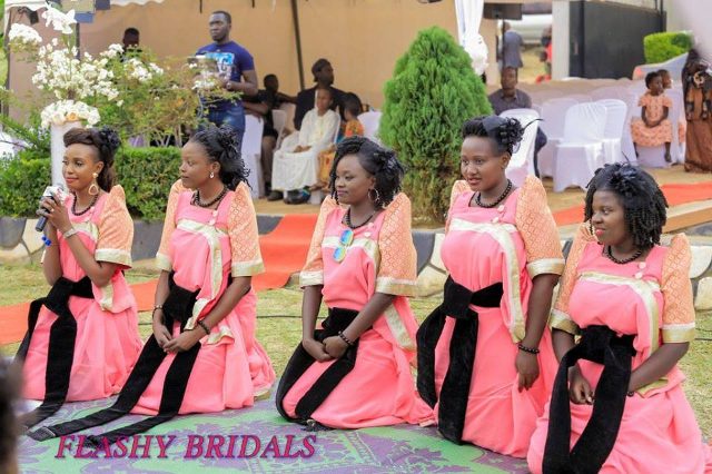 Barbara's Kwanjula Bridal Wear: Gold and Red Gomesi