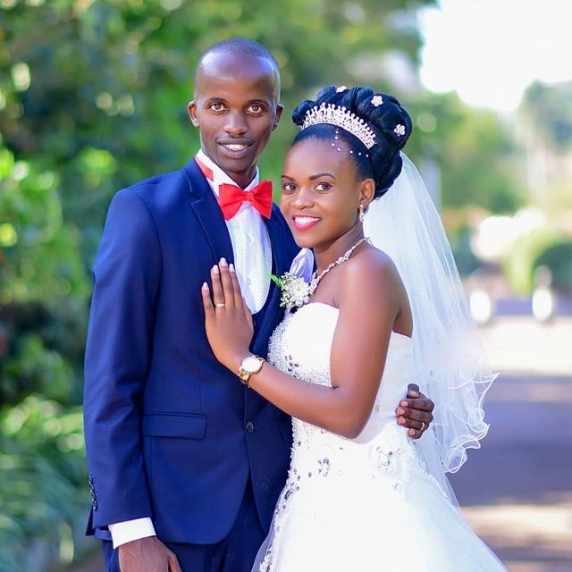 Ian and Grace pose for a photo on their wedding day, shots by Balam HD Studios