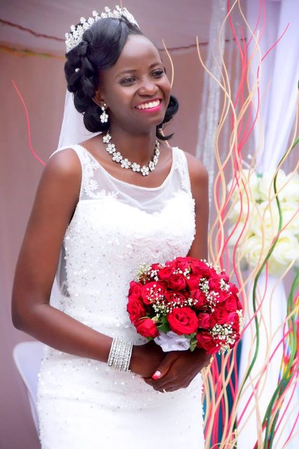 A happy Brendah on her big day as captured by Balam HD Studios