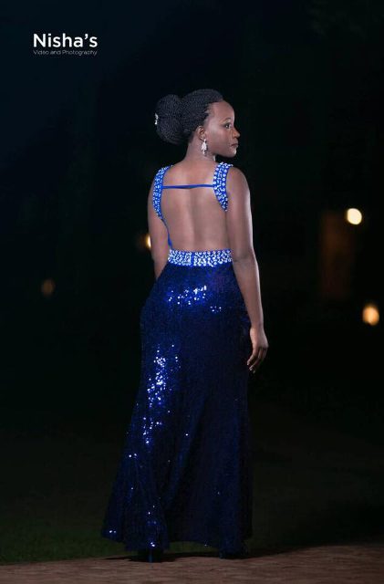 A back show sequined blue dress from Nisha's Bridal