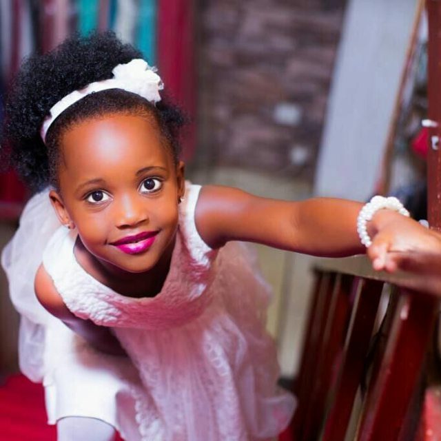 A gorgeous flower girl dressed by TEM Fashion WEAR