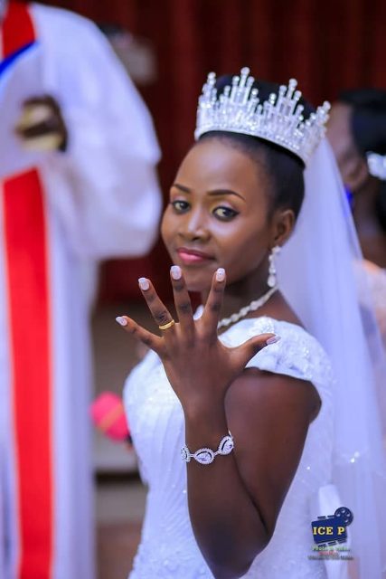 Peruth showing off her wedding ring and chic jewelry