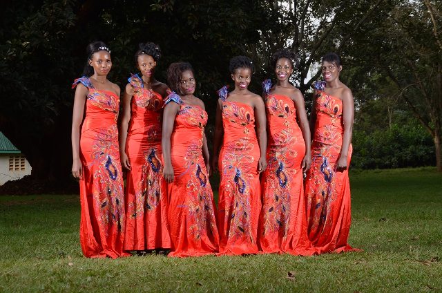 Models in red bridesmaids dresses by Lady Scarlet Bridals