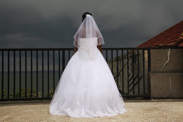 Back view of a strapless bow gown by Lady Scarlet Bridals