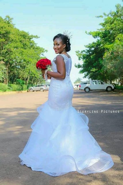 A beautiful Ugandan bride in mermaid gown from Peponi Clothings, photo by Storyline PictureUg
