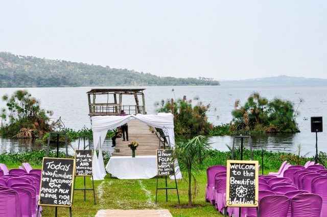 White & Purple themed church ceremony wedding decorations by Amka Deco