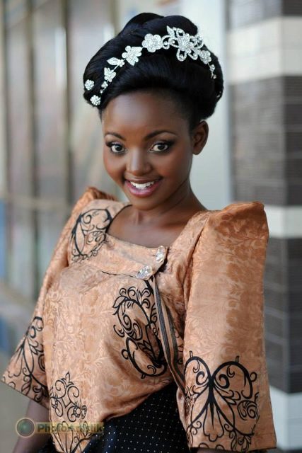 A beautiful bride in a gomesi, Makeup & hairdo by Salon lords and ladys