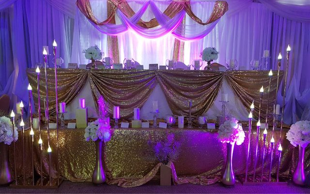 Gold and White inspired wedding high table decorations at Rivonia Suites