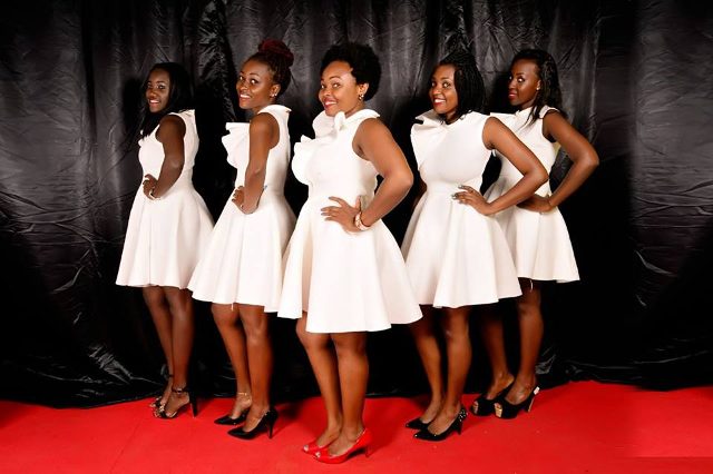 A studio photo of the Sleek Ushering Agency crew