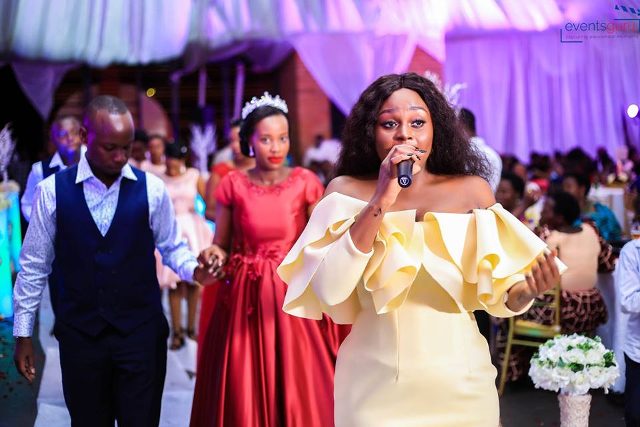 Rema Namakula performing at Mark & Rhita's wedding