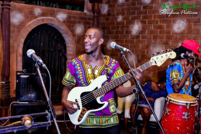 K'angie Band guitarist performing