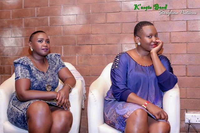 Angela Kalule waiting to perform with a colleague