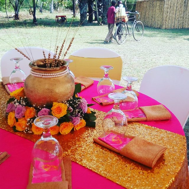 Gold and pink introduction ceremony decorations in Fort Portal by PTW & Events