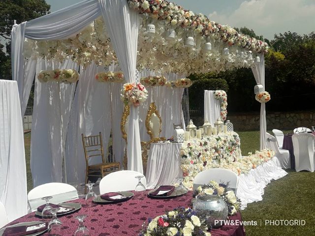 Jeremy & Fiona's plum and silver wedding decor at All sisters gardens Sonde