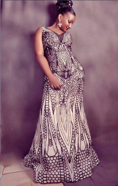 A model bride in a changing Dress by Aggie's bridals