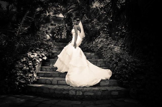 A bride in a strapless mermaid wedding gown