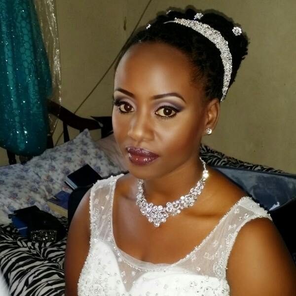 A Ugandan bride with makeup by Thenameis.Usher Makeup Artistry