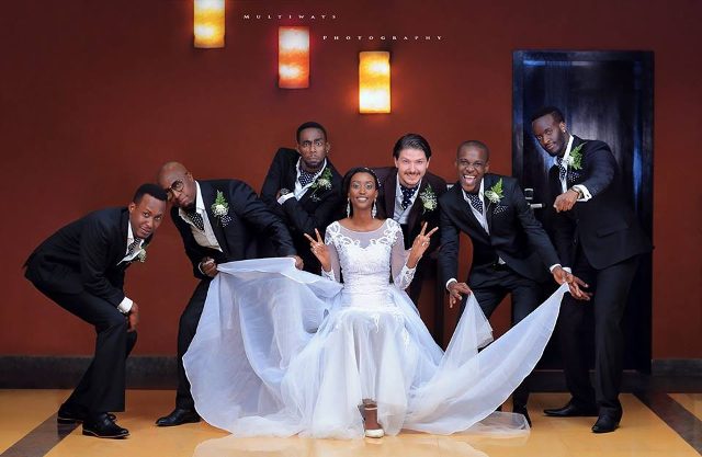 Loïs & Léontine along with the groomsmen, photo by MultiWays Photography