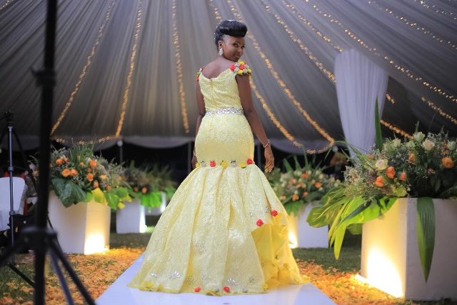 The bride, Julian, clad in her sleek custom made changing dress